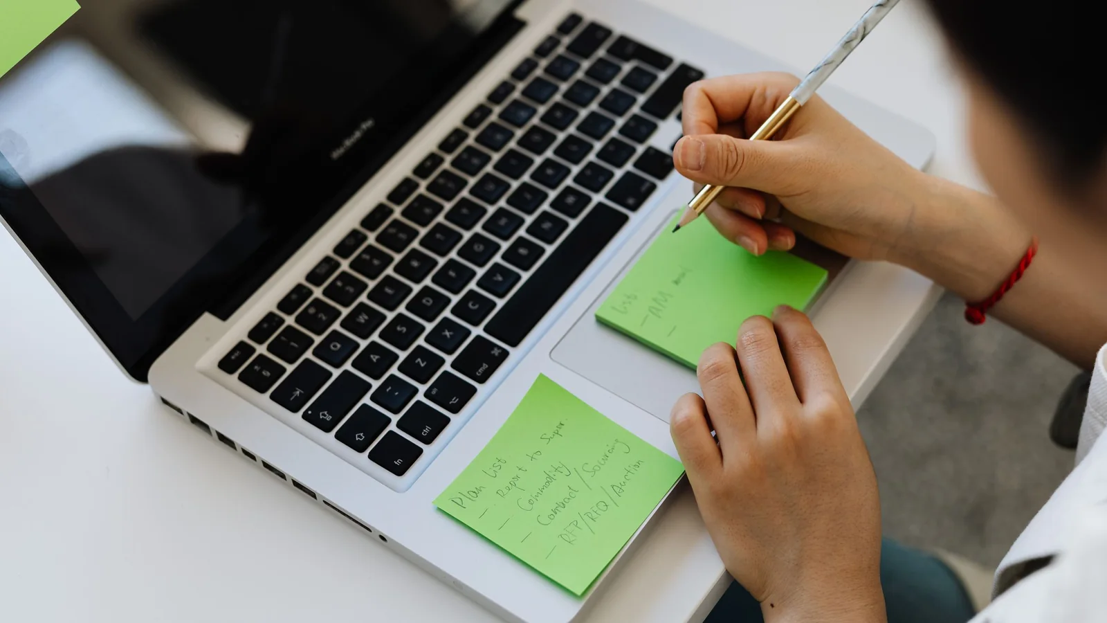 Notes and laptop during planning – reserving a car park at Dortmund Airport
