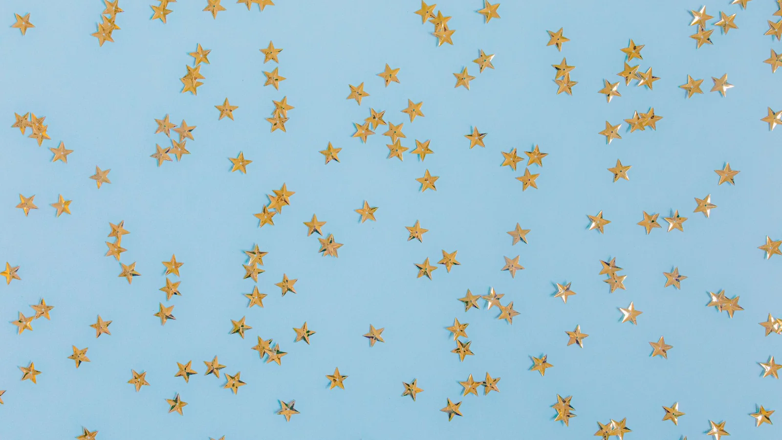 Small golden stars on a blue background – choosing a parking service at Hanover Airport
