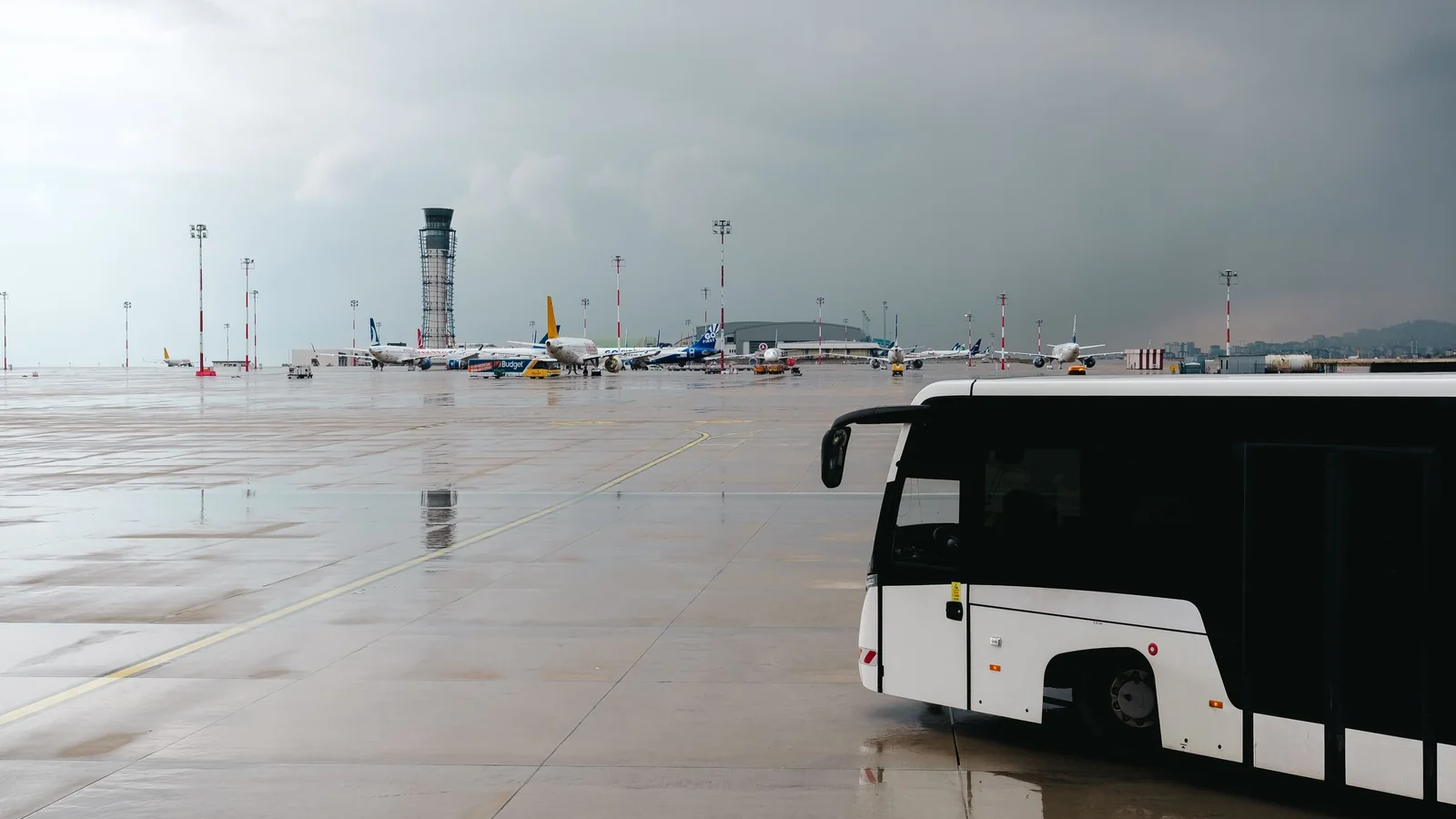 Apron bus on the airport grounds – shuttle parking at Berlin (BER) Airport