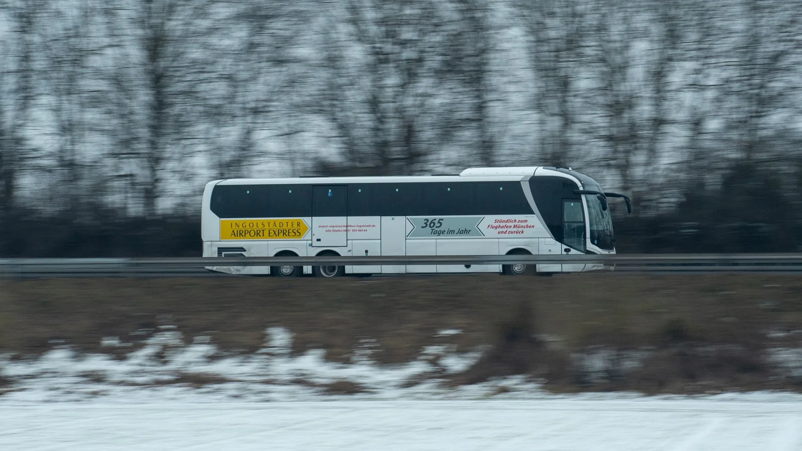 Airport express bus on a wintry road – shuttle parking at Karlsruhe/Baden-Baden Airport