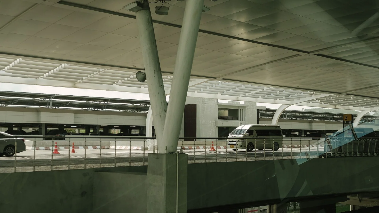 Minibus in the drop-off area of a terminal – shuttle parking at Stuttgart Airport